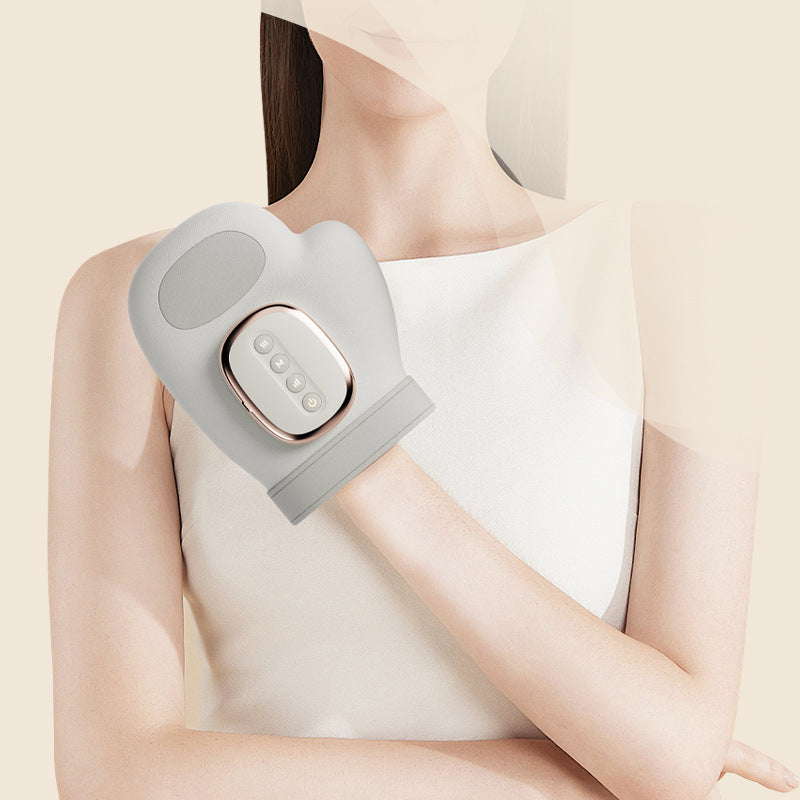 Heated hand and wrist massager in use